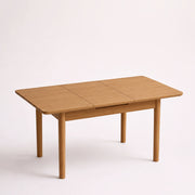 mesa de comedor de madera maciza extensible